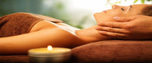 Load image into Gallery viewer, Lady Getting Massaged With Sweet Orange Moisturising Massage Candle  - Lemon Tree Natural Skin Care
